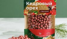 Ядро кедрового ореха в белом шоколаде с Брусникой