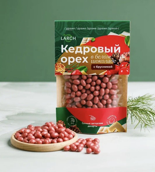 Ядро кедрового ореха в белом шоколаде с Брусникой